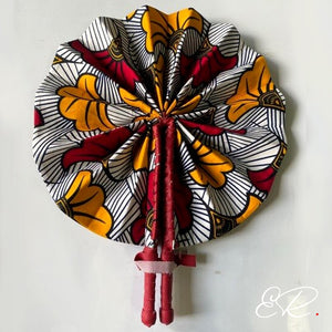 Eventail africain en wax orange et rouille