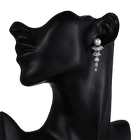 Boucles d'oreilles éventail perle visage mannequin noir